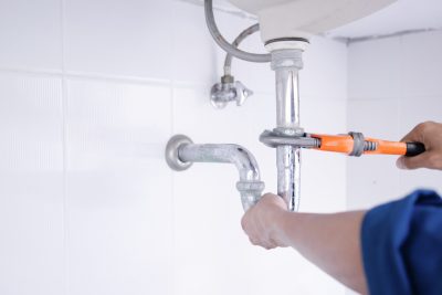 Residential Plumbing & Heating flyer highlighting expert sump pump repair.